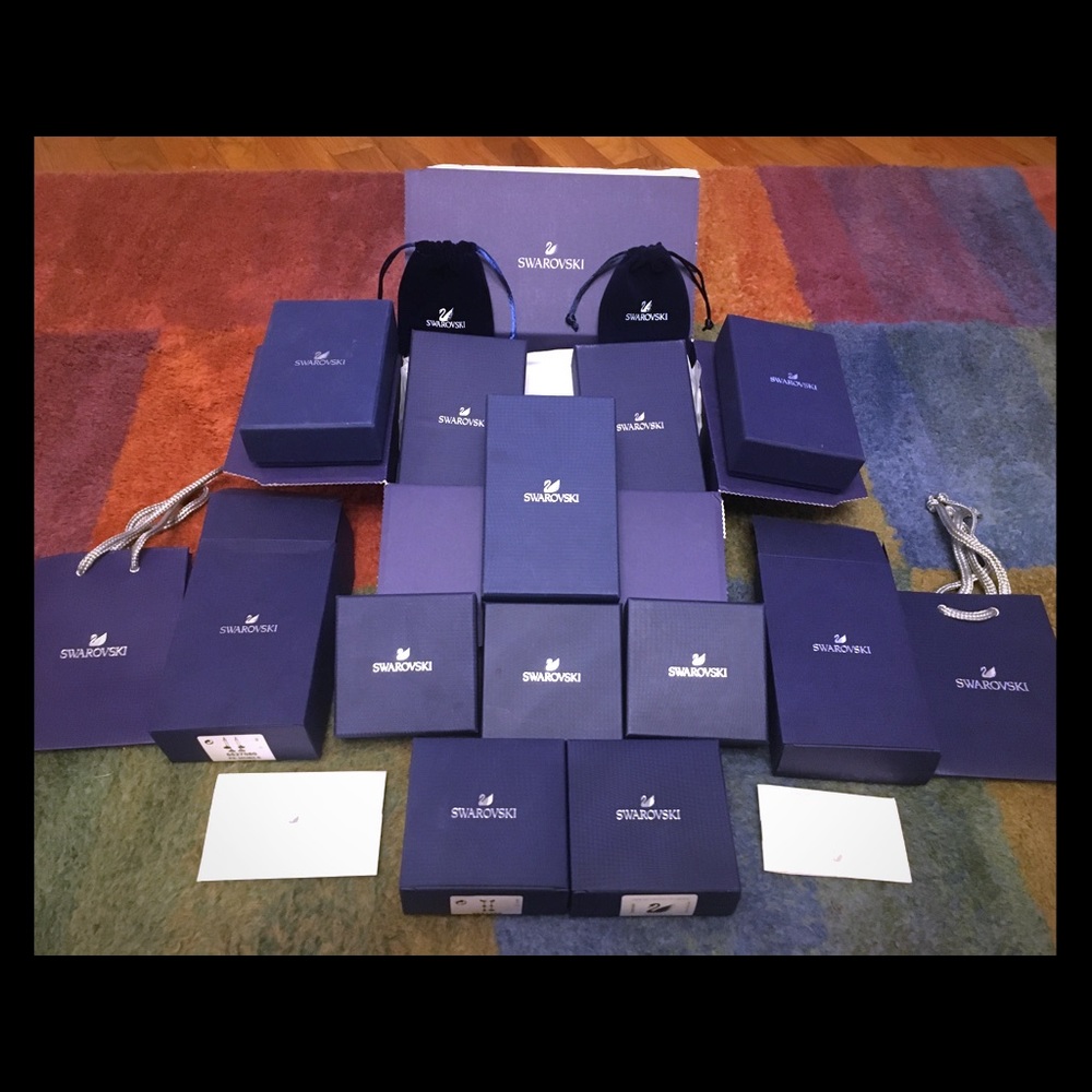 Huge lot of Authentic Swarovski boxes/bags/misc